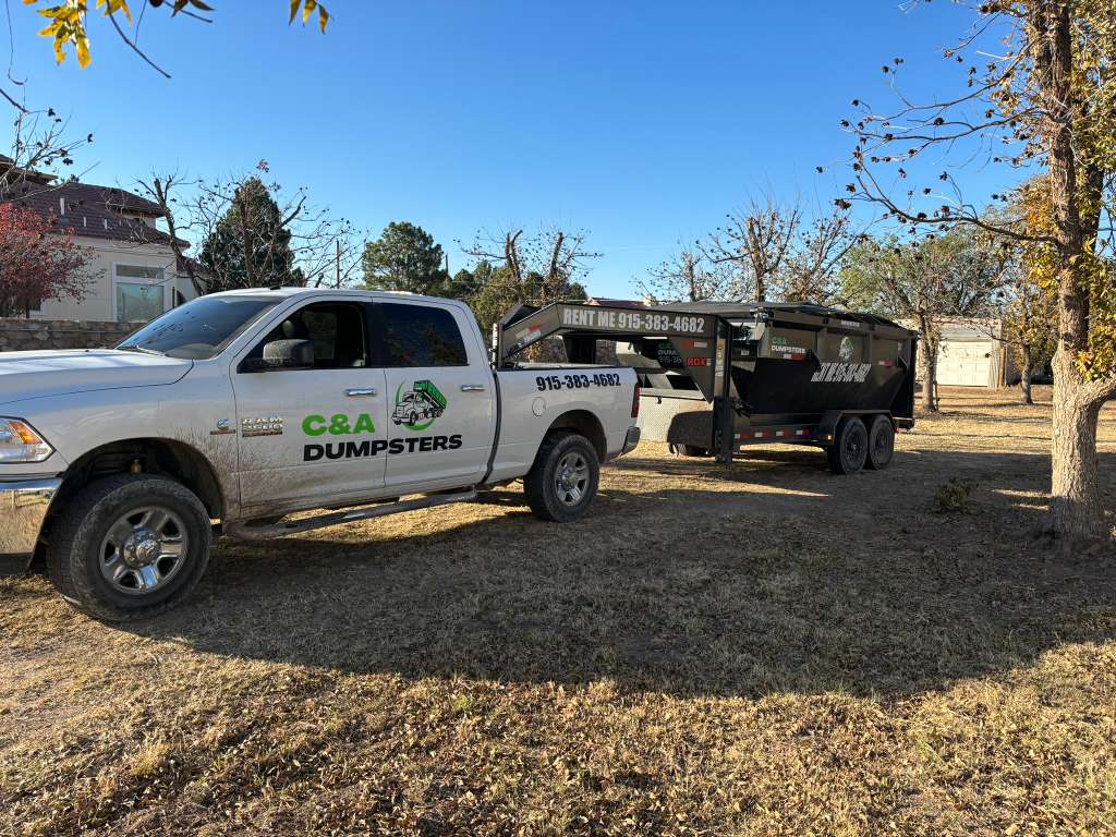 C&A Dumpster parked safely in a residential yard